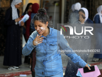 Palestinian students celebrate the last day in their final high school exams, known as ''Tawjihi'', in Gaza city on July 04, 2022.  (