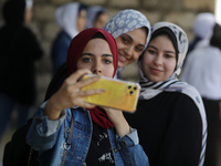 Palestinian students celebrate the last day in their final high school exams, known as ''Tawjihi'', in Gaza city on July 04, 2022.  (