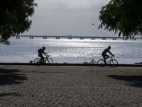 People are seen performing outdoor activities near the Herois do Mar promenade, in the vicinity of the Vasco da Gama bridge. Lisbon 03 July...