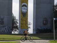 People are seen performing outdoor activities near the Herois do Mar promenade, in the vicinity of the Vasco da Gama bridge. Lisbon 03 July...