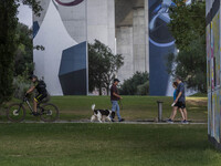 People are seen performing outdoor activities near the Herois do Mar promenade, in the vicinity of the Vasco da Gama bridge. Lisbon 03 July...