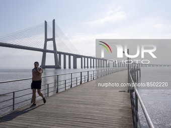 People are seen performing outdoor activities near the Herois do Mar promenade, in the vicinity of the Vasco da Gama bridge. Lisbon 03 July...