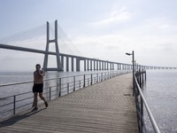 People are seen performing outdoor activities near the Herois do Mar promenade, in the vicinity of the Vasco da Gama bridge. Lisbon 03 July...