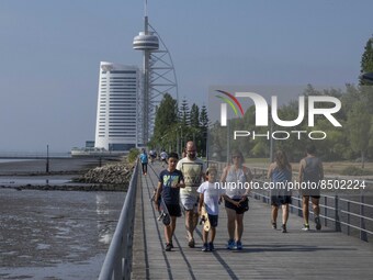 People are seen performing outdoor activities near the Herois do Mar promenade, in the vicinity of the Vasco da Gama bridge. Lisbon 03 July...