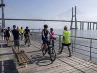 People are seen performing outdoor activities near the Herois do Mar promenade, in the vicinity of the Vasco da Gama bridge. Lisbon 03 July...