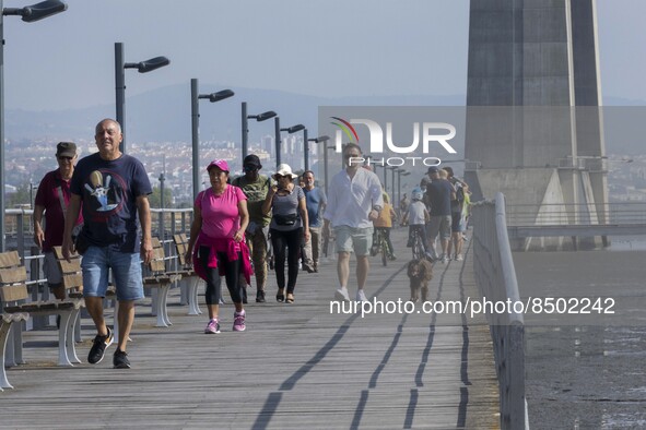 People are seen performing outdoor activities near the Herois do Mar promenade, in the vicinity of the Vasco da Gama bridge. Lisbon 03 July...