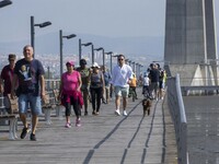 People are seen performing outdoor activities near the Herois do Mar promenade, in the vicinity of the Vasco da Gama bridge. Lisbon 03 July...