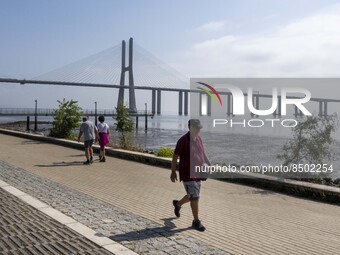 People are seen performing outdoor activities near the Herois do Mar promenade, in the vicinity of the Vasco da Gama bridge. Lisbon 03 July...