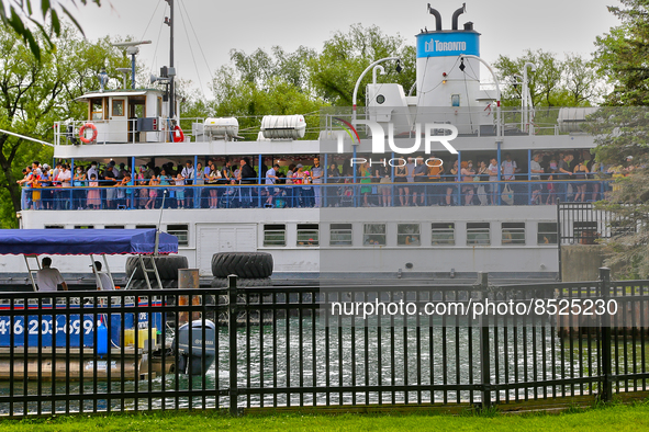 People crowded onto a ferry boat at Centre Island in Toronto, Ontario, Canada on July 08, 2022. Heath officials have announced that Ontario...