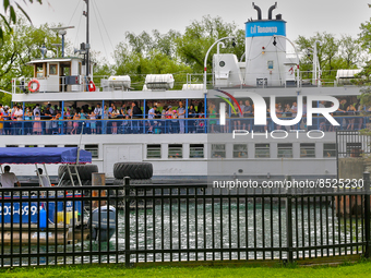 People crowded onto a ferry boat at Centre Island in Toronto, Ontario, Canada on July 08, 2022. Heath officials have announced that Ontario...