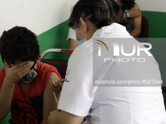  A child receives a Pfizer first dose at the  Portales Health Center during a health campaign to children under 9 years of age  at the start...