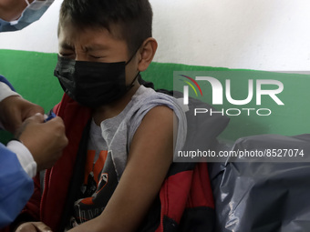  A child receives a Pfizer first dose at the  Portales Health Center during a health campaign to children under 9 years of age  at the start...