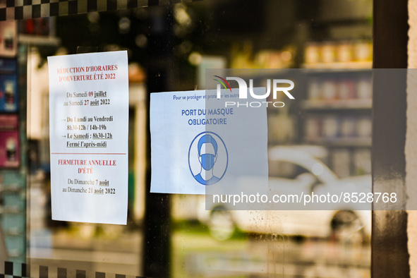 Wearing a mask is mandatory in this pharmacy. France sees a resurgence of Covid19 cases. Many people come to get tested in  Clermont-Ferrand...