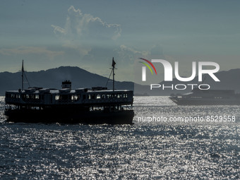 Boats sailing in Victoria Harbour on July 12, 2022 in Hong Kong, China. The Hong Kong Government announce that it would extend social distan...