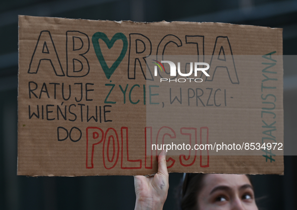 An activist holds a placard with words 'Abortion saves lives, unlike the police'.
Polish activist, Justyna Wydrzynska is facing three years...