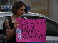 An activist holds a placard with words 'Praise to the heroines'.
Polish activist, Justyna Wydrzynska is facing three years in prison for giv...