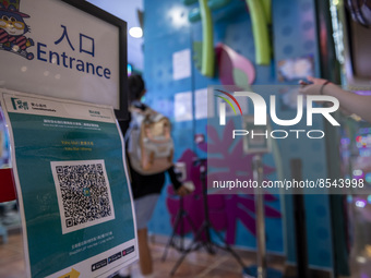 The Leave Home Safe QR code placed at the entrance of a store inside a shopping mall on July 15, 2022 in Hong Kong, China. (