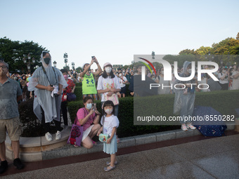 Hong Kong, China, 10 Jul 2022, People watch a show in Hong Kong Disneyland. (