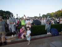 Hong Kong, China, 10 Jul 2022, People watch a show in Hong Kong Disneyland. (