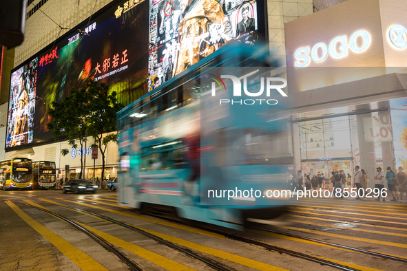 Hong Kong, China, 15 Jul 2022, A tramway passes in Causeway Bay in this slow shutter pictures. 