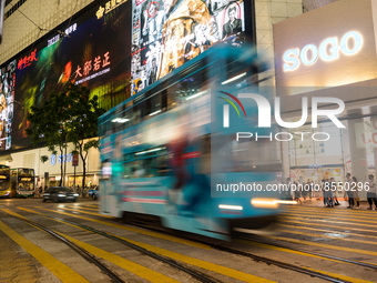 Hong Kong, China, 15 Jul 2022, A tramway passes in Causeway Bay in this slow shutter pictures. (