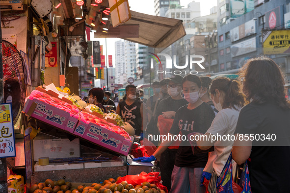 Hong Kong, China, 16 Jul 2022, People buy fruits in Yuen Long. 