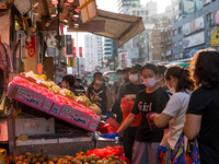 Hong Kong, China, 16 Jul 2022, People buy fruits in Yuen Long. (