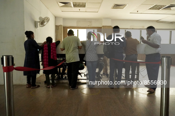 People register themselves to receive a dose during a vaccination drive against coronavirus, at a hospital in Noida on the outskirts of New...