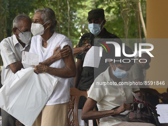 People getting  COVID 19 booster vaccines near amid economic Crisis in Colombo Sri Lanka July 27, 2022
 (