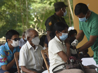 People getting  COVID 19 booster vaccines near amid economic Crisis in Colombo Sri Lanka July 27, 2022
 (