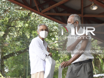 People getting  COVID 19 booster vaccines near amid economic Crisis in Colombo Sri Lanka July 27, 2022
 (