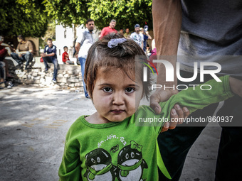 A migrant child, in Kos, Greece, on October 18, 2015. More than 400,000 refugees, mostly Syrians and Afghans, arrived in Greece since early...