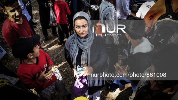 Hundreds of refugees continue to arrive on the Greek Island of Kos from Bodrum, Turkey, on October 21, 2015. Both the local community and la...