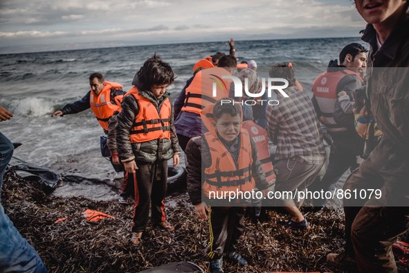 Children with their lifejackets still on after embarking on the Greek island of Lesbos, on September 29, 2015.  