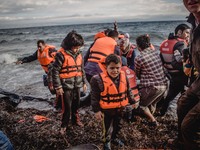 Children with their lifejackets still on after embarking on the Greek island of Lesbos, on September 29, 2015.  (