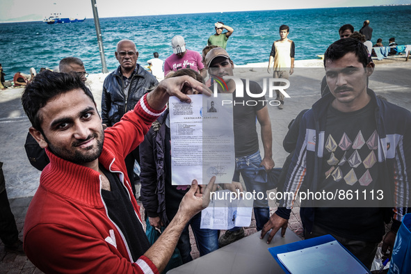 Hundreds of refugees continue to arrive on the Greek Island of Kos from Bodrum, Turkey, on October 21, 2015. Both the local community and la...