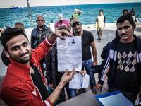 Hundreds of refugees continue to arrive on the Greek Island of Kos from Bodrum, Turkey, on October 21, 2015. Both the local community and la...