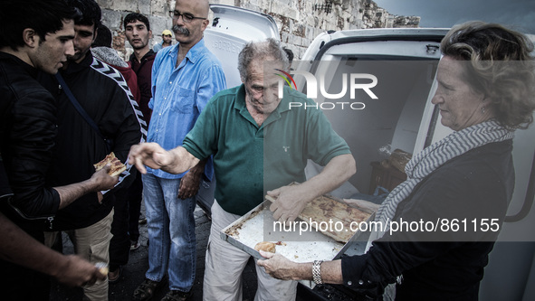 Hundreds of refugees continue to arrive on the Greek Island of Kos from Bodrum, Turkey, on October 21, 2015. Both the local community and la...