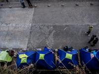 Hundreds of refugees continue to arrive on the Greek Island of Kos from Bodrum, Turkey, on October 21, 2015. Both the local community and la...