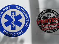 The logo of the State Emergency Medical Services seen on an ambulance parked in the center of Krakow.
According to today's Ministry of Healt...