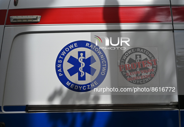 The logo of the State Emergency Medical Services seen on an ambulance parked in the center of Krakow.
According to today's Ministry of Healt...