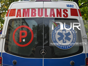 The logo of the State Emergency Medical Services seen on an ambulance parked in the center of Krakow.
According to today's Ministry of Healt...