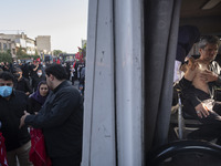 An Iranian man receives a dose of the Iranian Noora new coronavirus disease (COVID-19) vaccine at a mobile vaccination station during a cere...