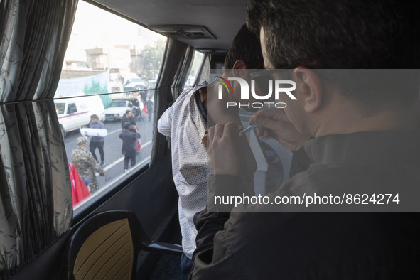 An Iranian man receives a dose of the Iranian Noora new coronavirus disease (COVID-19) vaccine at a mobile vaccination station during a cere...