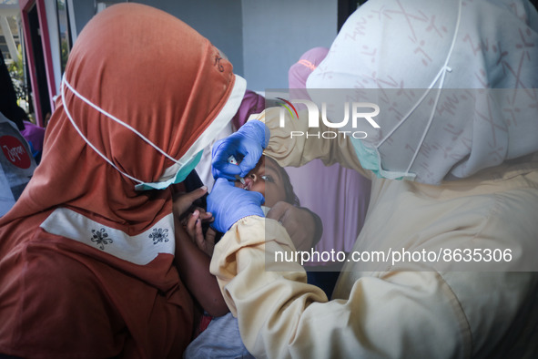 
A crying baby is immunized by a medical officer, during the BIAS (National Child Immunization Month) program at  Integrated Healthcare Cen...