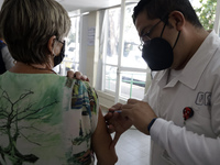 August 8, 2022, Mexico City, Mexico: Health personnel apply the CanSino Covid19 vaccine for adults in the first dose or booster dose at the...