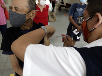 August 8, 2022, Mexico City, Mexico: Health personnel apply the CanSino Covid19 vaccine for adults in the first dose or booster dose at the...