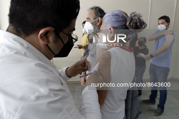 August 8, 2022, Mexico City, Mexico: Health personnel apply the CanSino Covid19 vaccine for adults in the first dose or booster dose at the...