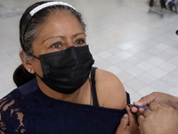 August 8, 2022, Mexico City, Mexico: Health personnel apply the CanSino Covid19 vaccine for adults in the first dose or booster dose at the...