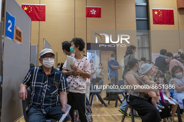 People waiting in line to get a jab of the Sinova CoronaVac vaccine made by Sinovac Biotech Ltd. a Chinese biopharmaceutical company at a Va...